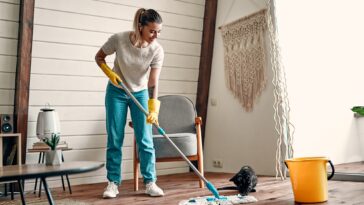 Woman doing house cleaning.